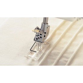 Pėdelė kordui įsiūti plokščiasiūlei mašinai